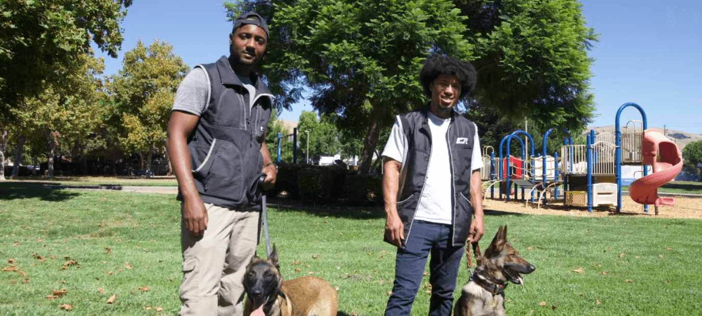 Rodney and Kenneth with their Belgian Malinois in the Bay Area